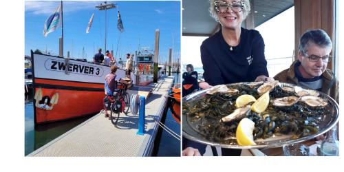 Zwerver3 en oesters eten in Yerseke
